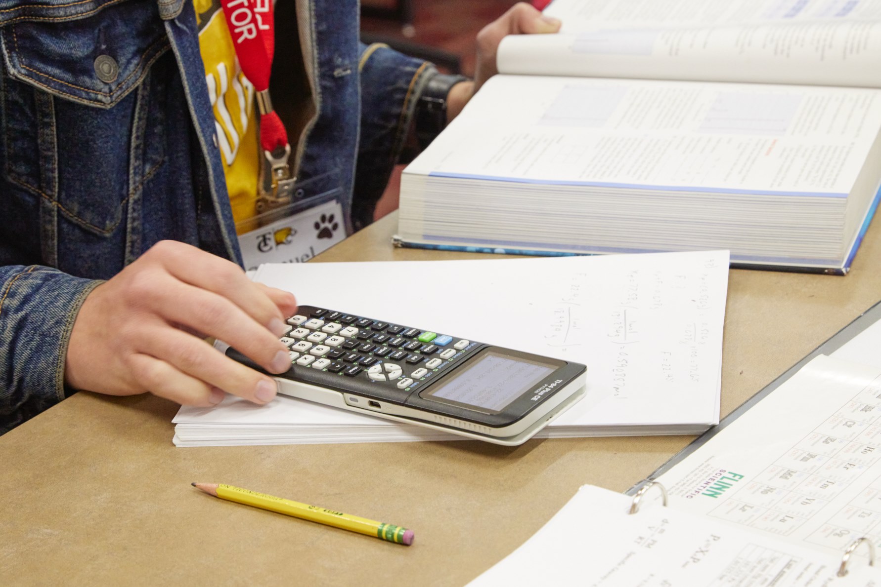 ostensibly fiscally secure student looking at books regarding fiscal services presumably