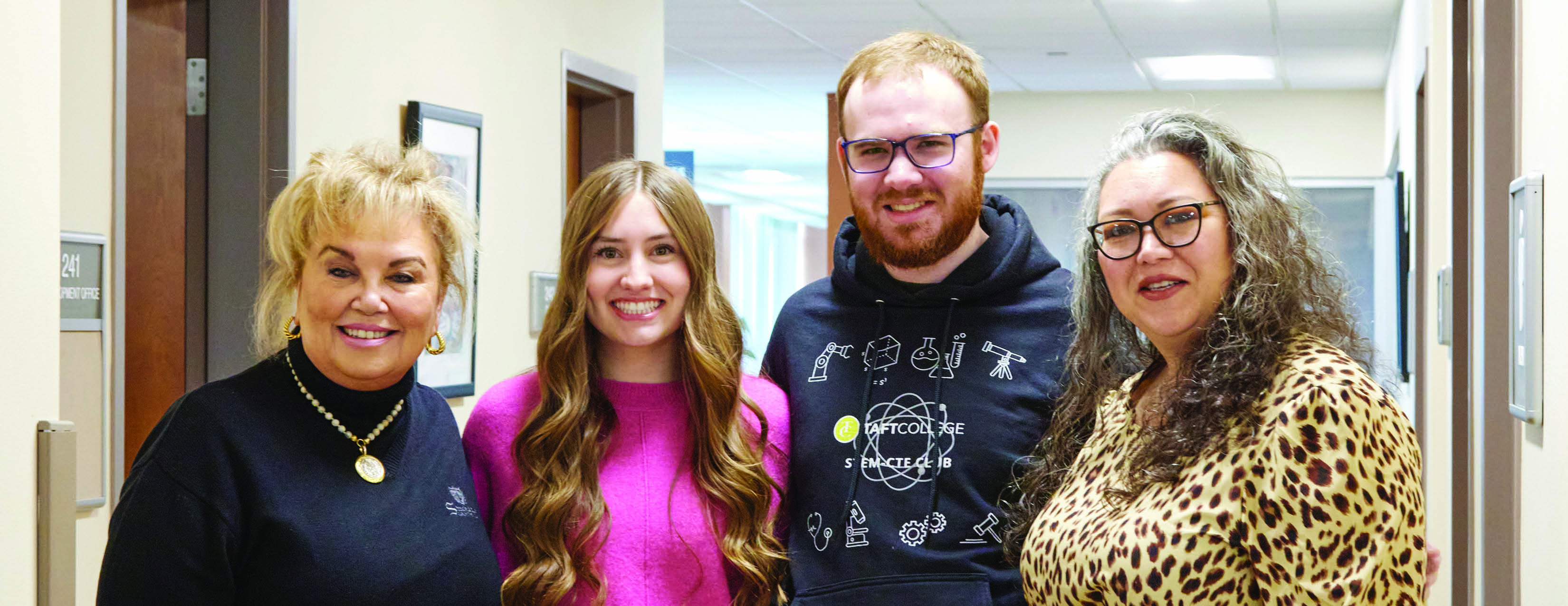 Staff from Foundation and two Class of 2023 HEPP graduates